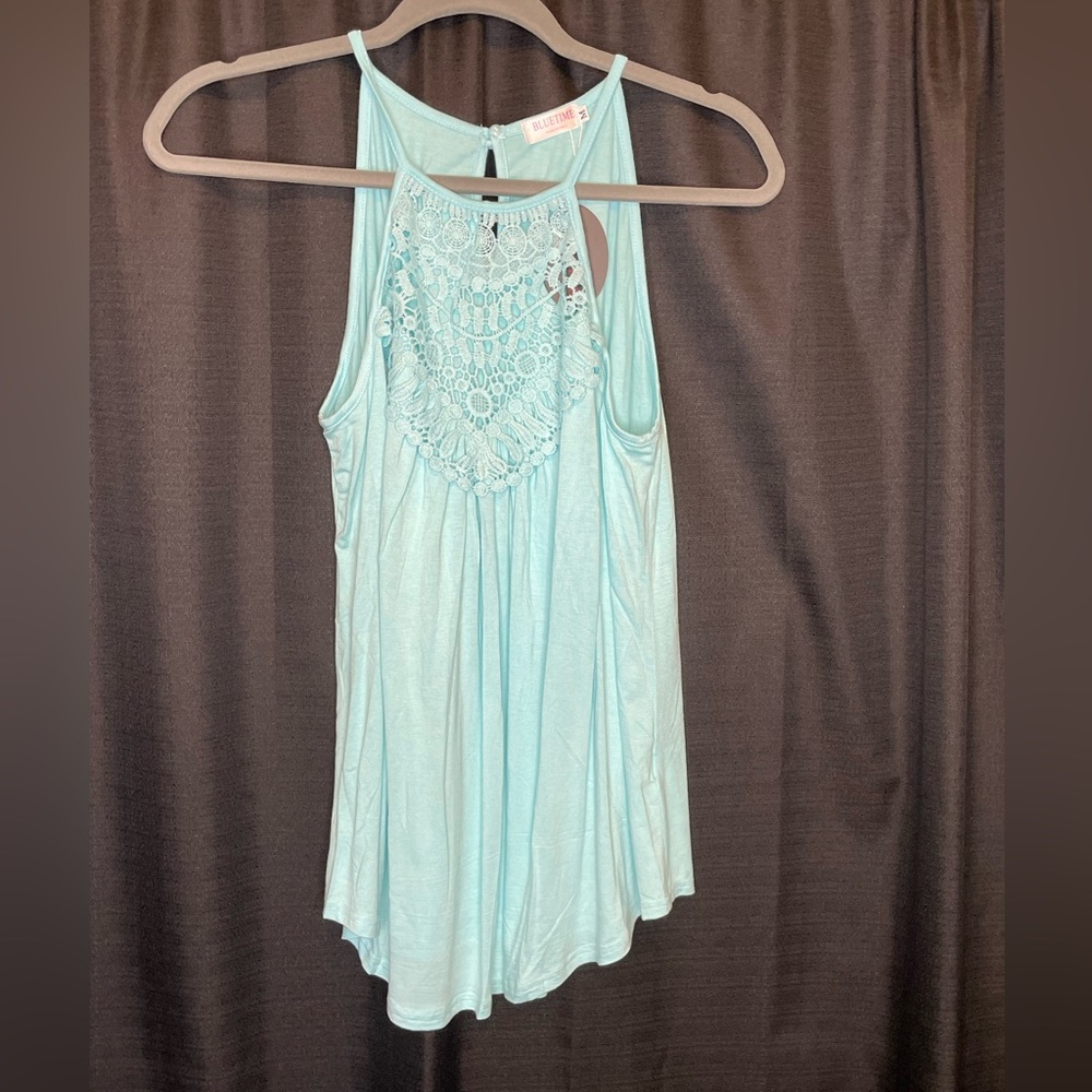 Mint green tank top.